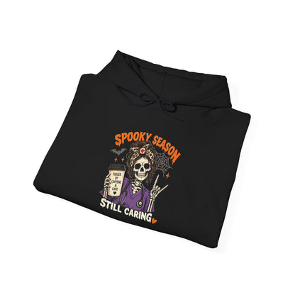 Halloween Nurse Sweatshirt – Spooky Season Still Caring Skeleton Nurse Crewneck – Caffeine & Care Healthcare Halloween Sweater