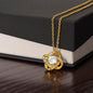 "Bound by Love: Elegant Love Knot Necklace"